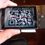 Smartphone scanning a QR code